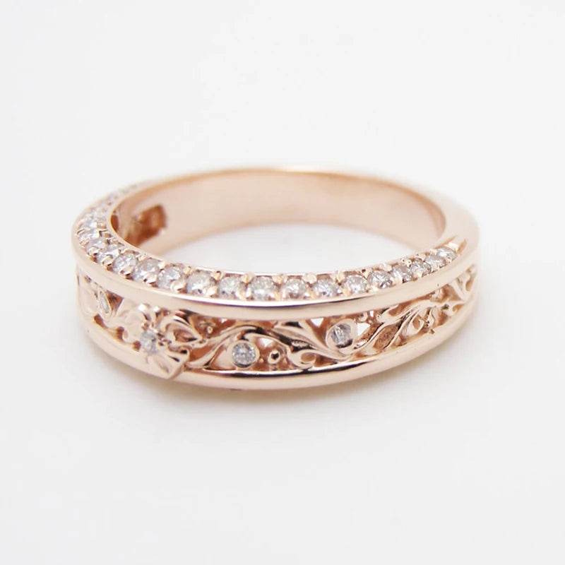 Chic rose gold party accessories ring with intricate floral design and sparkling crystals
