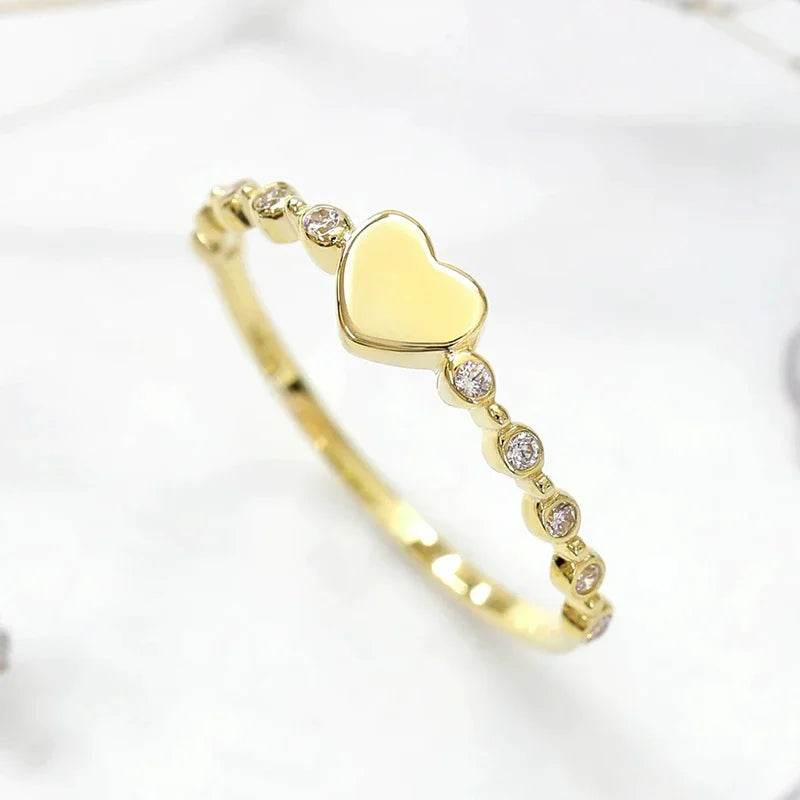 Jewelrieshub gold heart zirconia delicate finger ring with small clear stones on band
