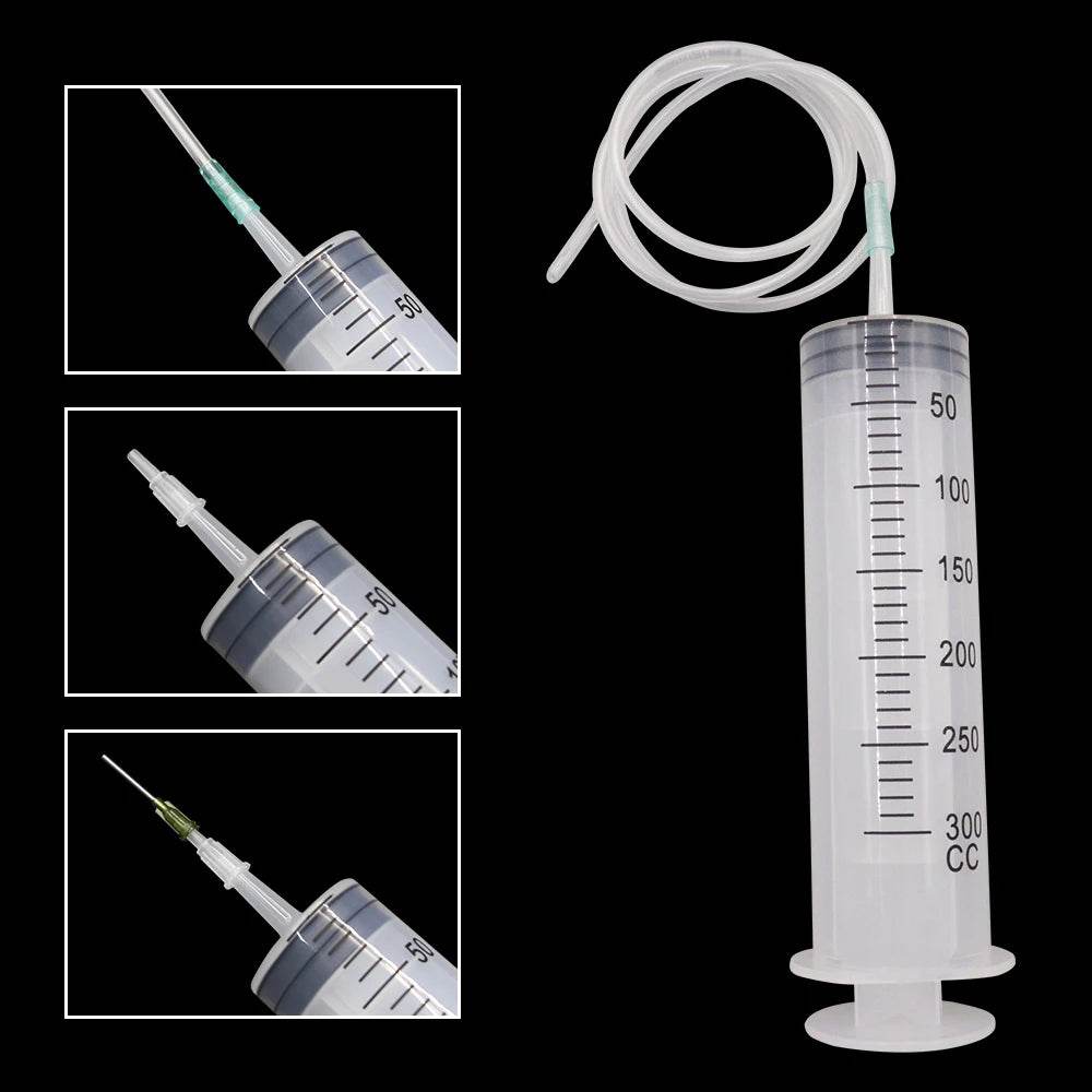 Large plastic syringe with tube and detailed measurement markings up to 300 cc
