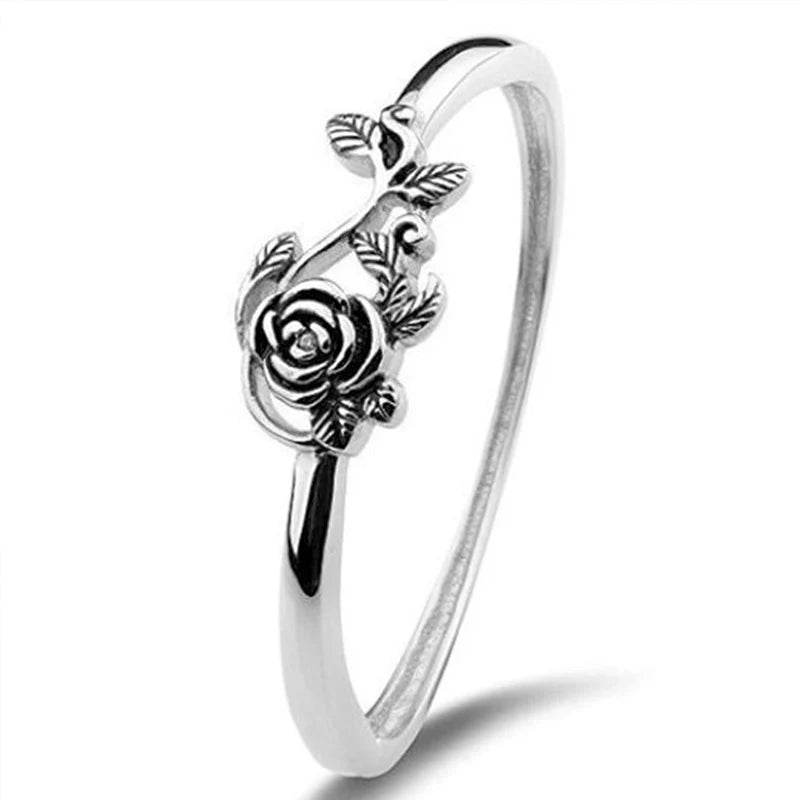 Elegant floral statement ring by Jewelrieshub featuring detailed rose and leaf design in silver tone
