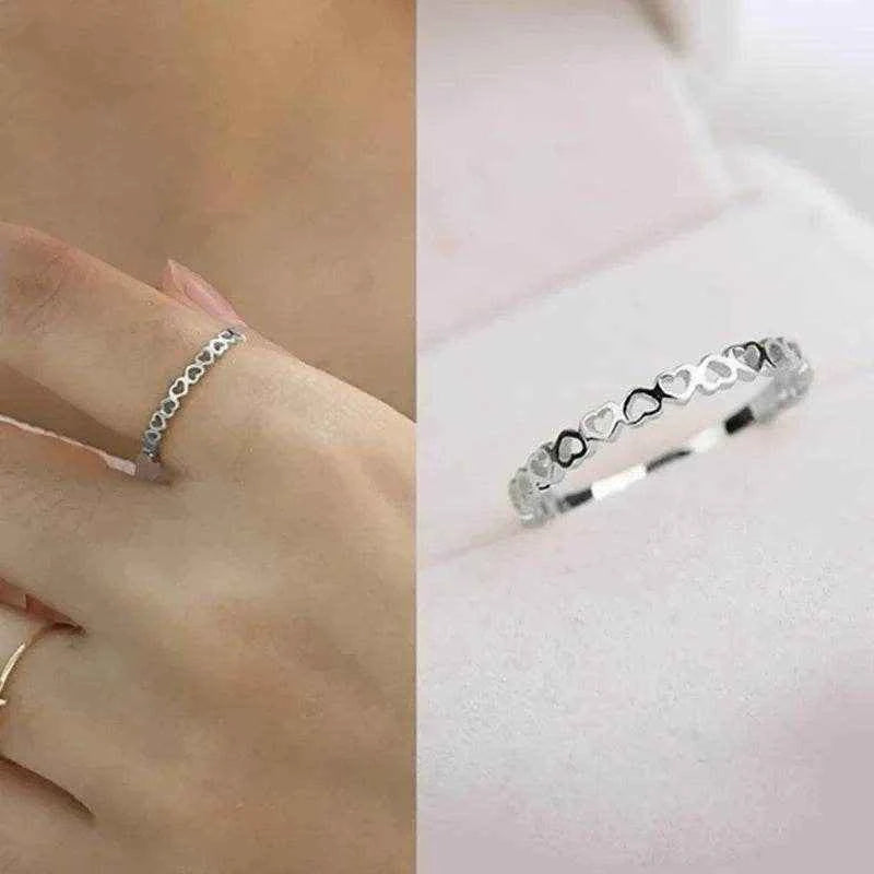 Jewelrieshub Rose Gold Hollow Heart Finger Ring