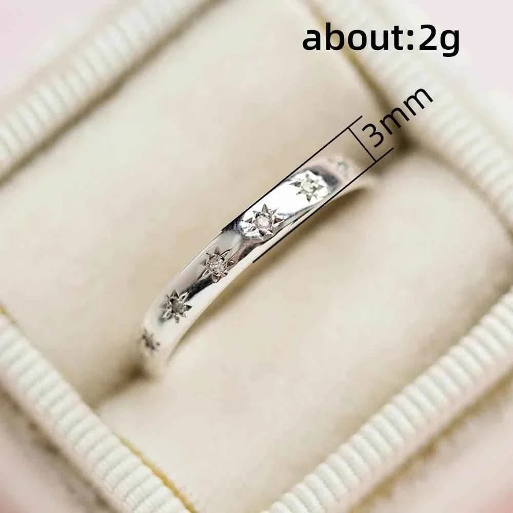 Jewelrieshub Simple Silver Band Ring with Star Design