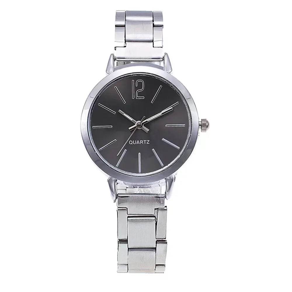 Simple stainless steel ladies watch with black dial and silver metal band by Qoraheyhub