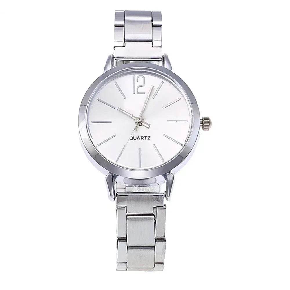 Simple stainless steel ladies watch with silver band and minimalist white dial