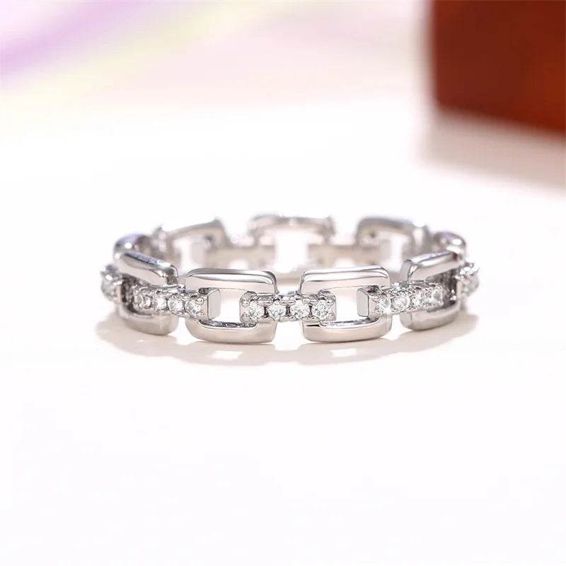 Jewelrieshub women's silver chain shape accessory ring with sparkling stones on white background