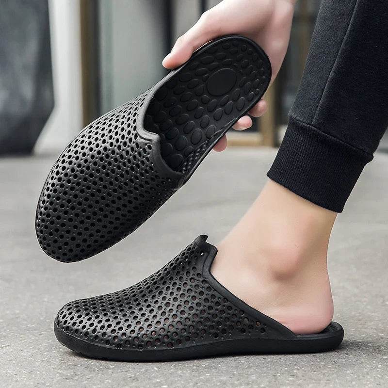 Black breathable slip-on shoes shown in summer sale stylish footwear collection for comfort and casual wear