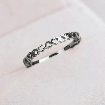 Jewelrieshub silver hollow heart finger ring with interconnected heart shapes design