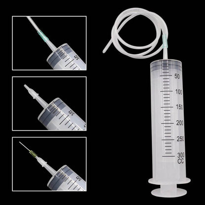 Large plastic syringe with tube and detailed measurement markings up to 300 cc