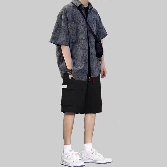 Casual men's two piece shorts set with black cargo shorts and a patterned short sleeve shirt