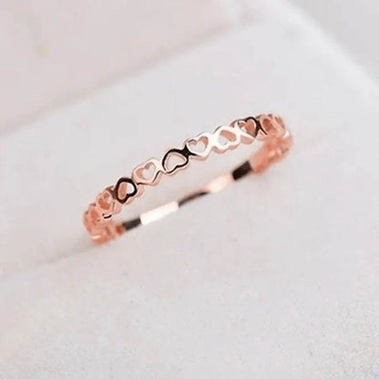 Jewelrieshub rose gold hollow heart finger ring with delicate linked heart design